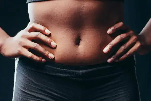Toning Your Stomach: The Ultimate Guide to Achieving a Sculpted Stomach While Shedding Pounds 1 Image of a toned stomach after non surgical treatment Rochester